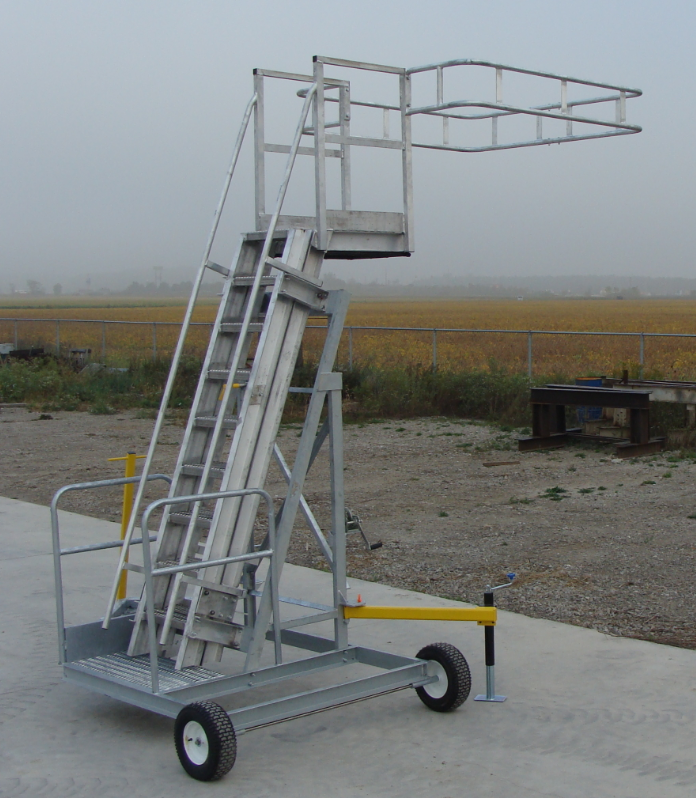 Porta-Rack mid-reach portable truck and railcar access platform on a concrete pad
